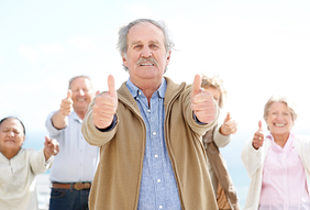 group of seniors with thumbs up