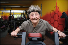 elderly woman pumping iron