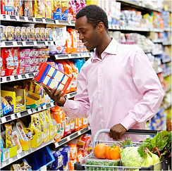 man reviewing food label resized 600